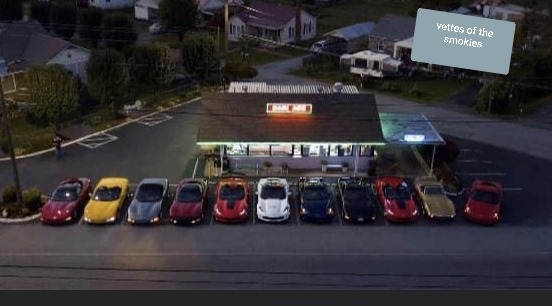 Picture of Corvettes in front of diner.
